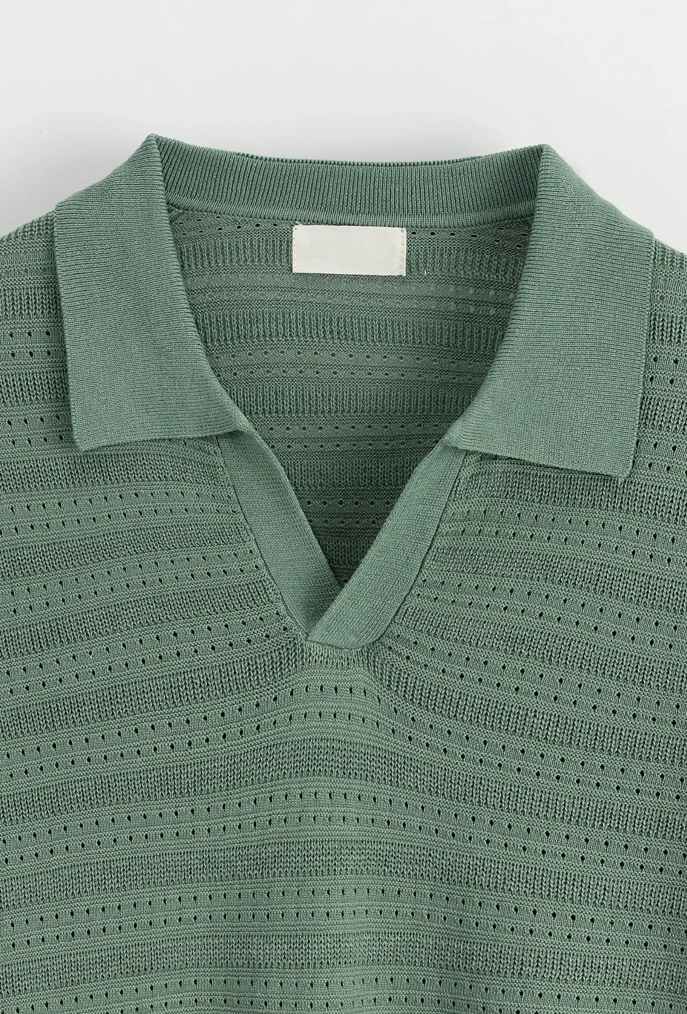 Polo manches courtes vert texturé – Col sans boutons